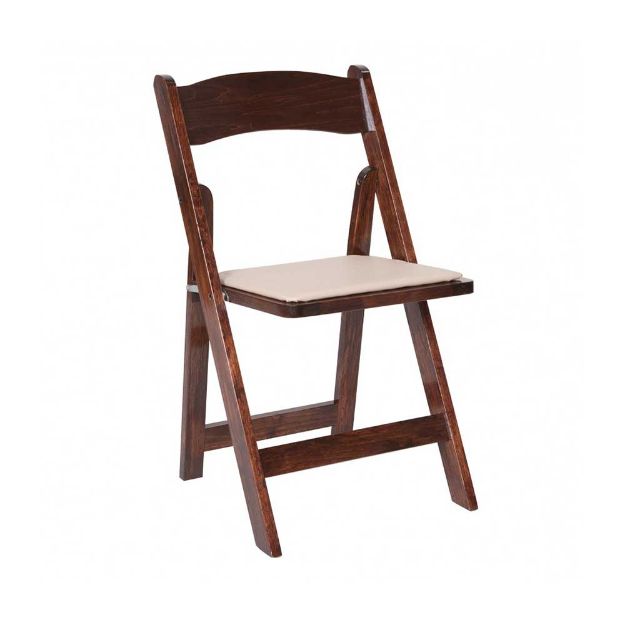 Side view of a fruitwood colored folding rental chair against a white background.