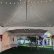 Square Matrix tents featuring rental G4 String Lighting strung up in the ceiling.