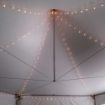 Newly installed rental G4 String Lighting strung up in the ceiling of a Matrix Hexagon Tent.