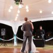 Bride and groom dancing on 9' x 12' rental wood dance floor.