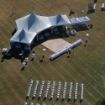Wedding ceremony and receptions set up using a Dancing Under the Stars Small wedding tent package.