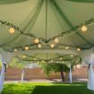 Dancing Under the Stars 420 Canopy with globe lighting, greenery and swagging to light the way to an epic party.