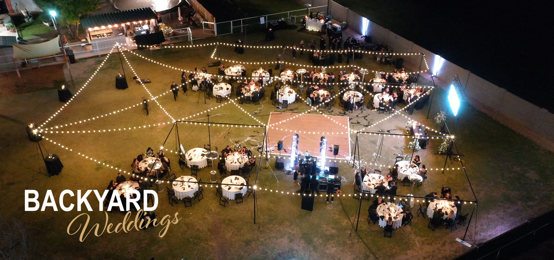 Large Exo Tent wedding package set up in a backyard.